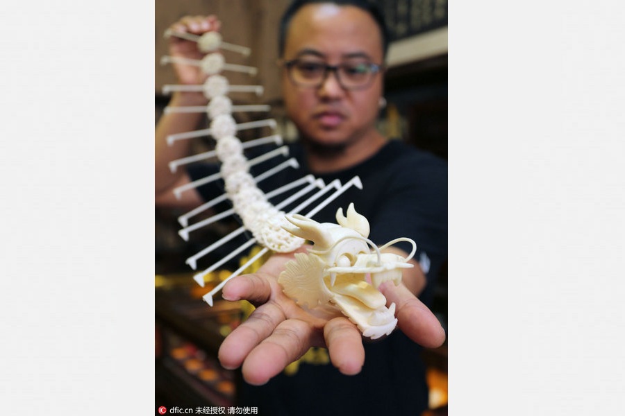 Bone sculpture: A centipede kite with dragon head