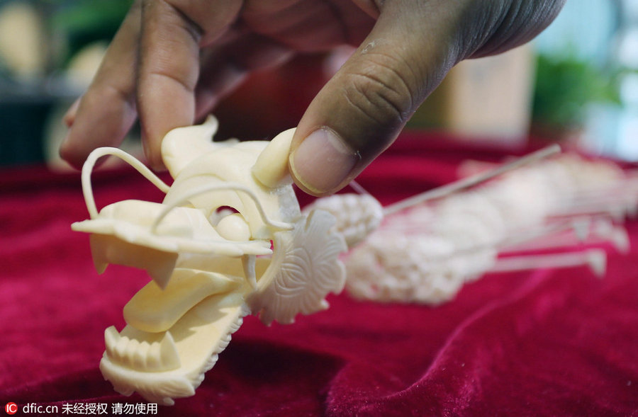 Bone sculpture: A centipede kite with dragon head