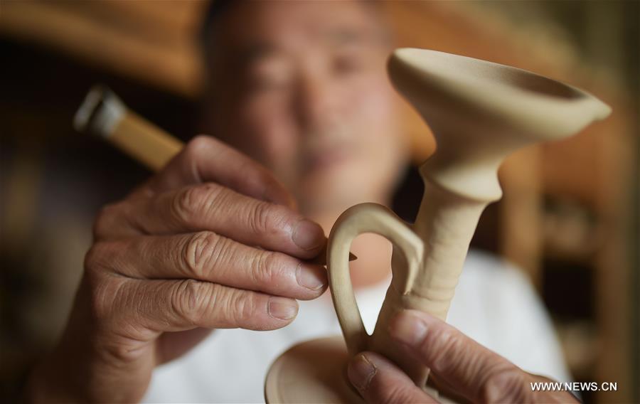 'Green' pottery: Intangible cultural heritage of Sichuan