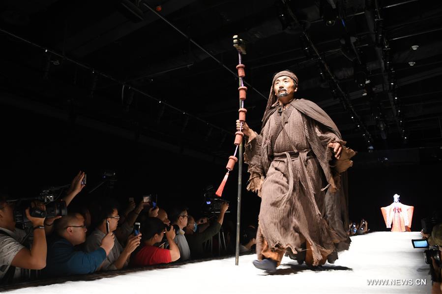 Actors perform during melodrama featuring silk road culture in Dunhuang