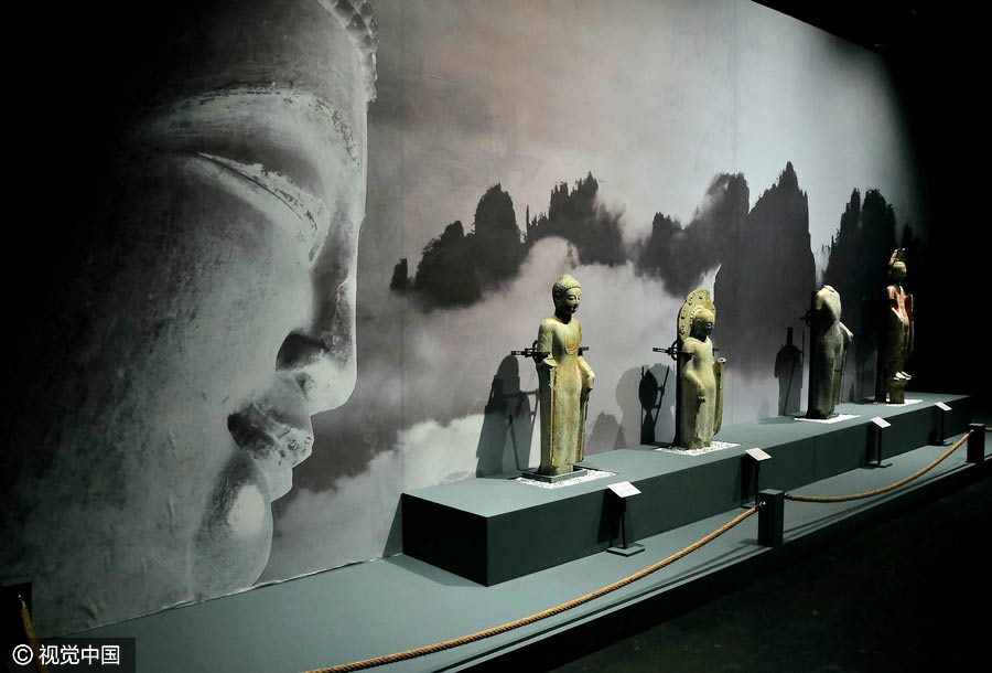 Chinese and Indian sculptures on display at the Palace Museum in Beijing