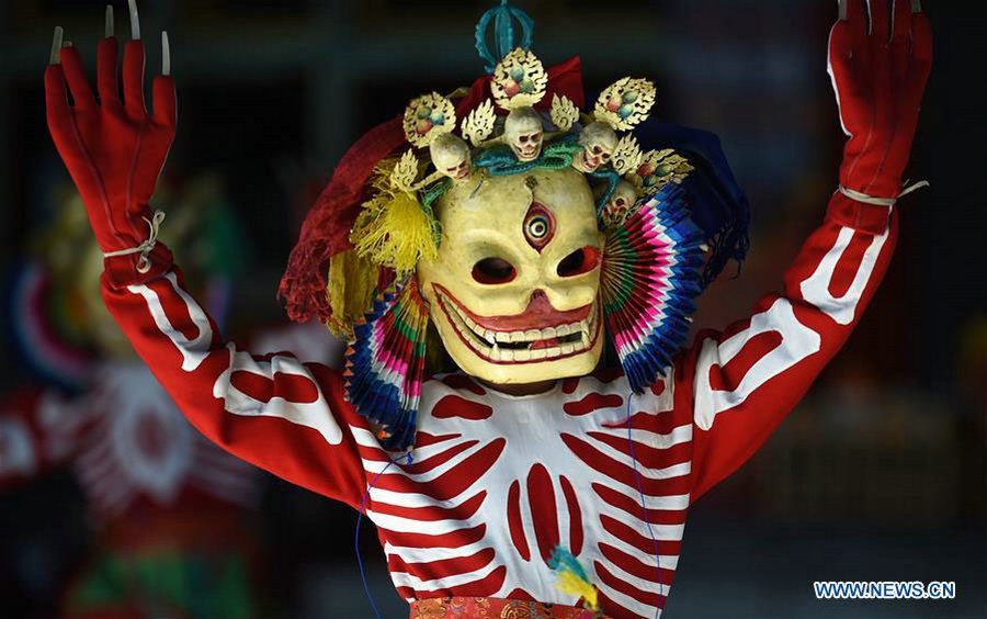 Lamas perform cham dance in China's Tibet