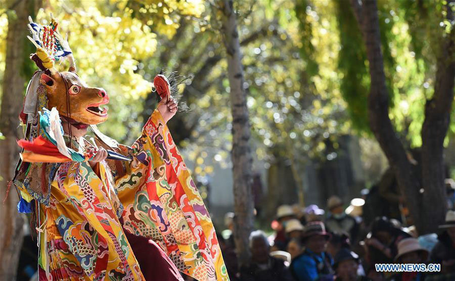 Lamas perform cham dance in China's Tibet