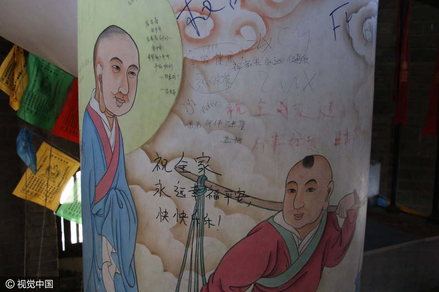 Thousand-year-old pagoda defaced by tourist graffiti