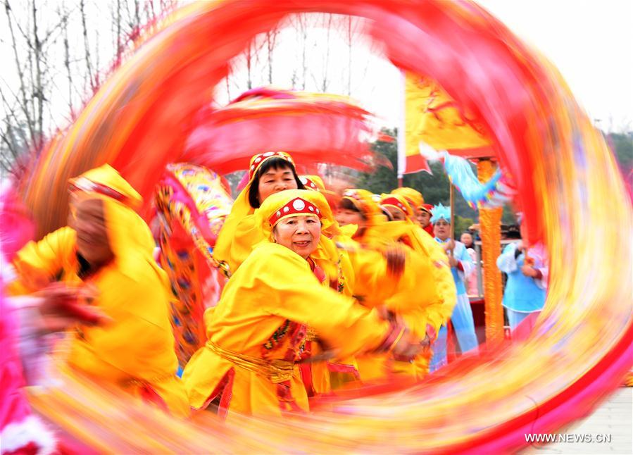 People perform dragon dance in Wuhan