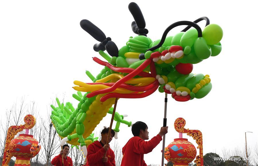 People perform dragon dance in Wuhan