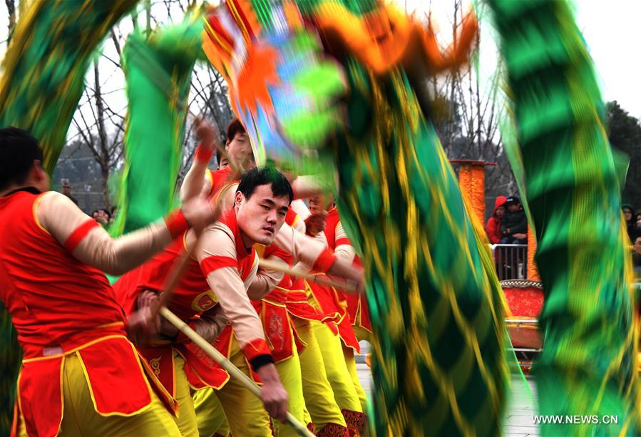 People perform dragon dance in Wuhan