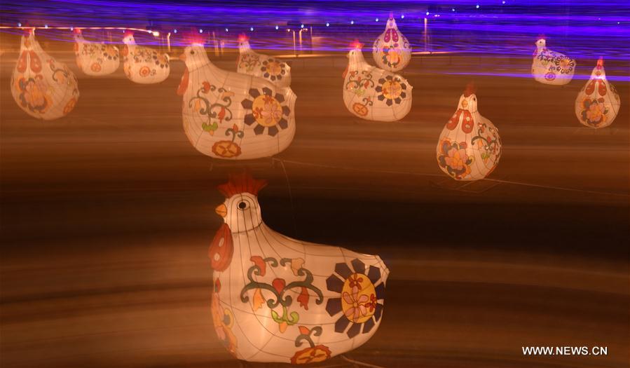 Lanterns in shape of rooster seen in NW China