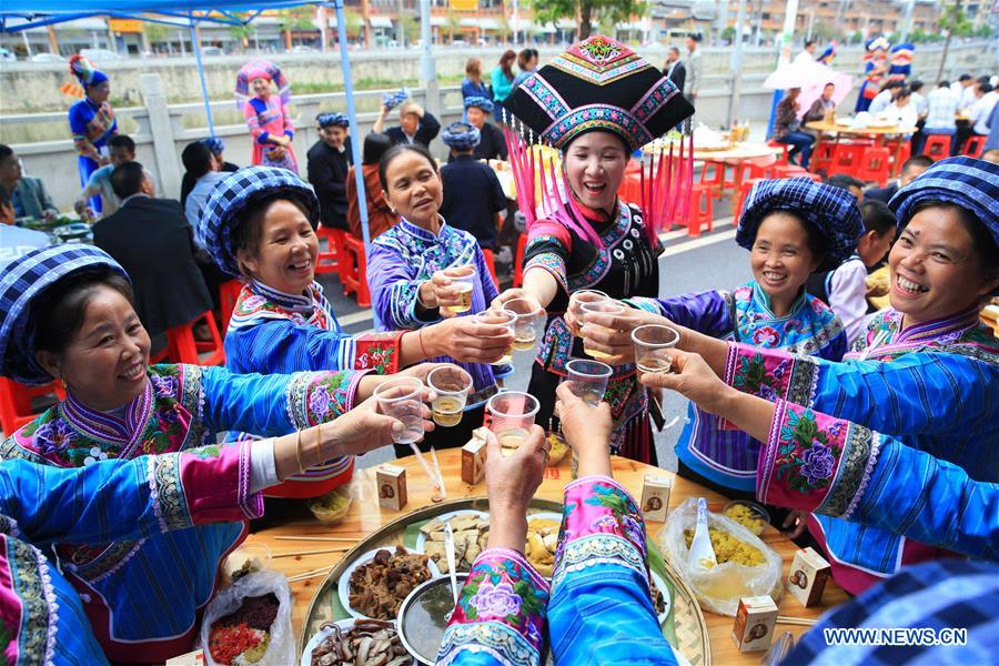 People of Zhuang ethnic group attend 'hundred-family banquet' in S China