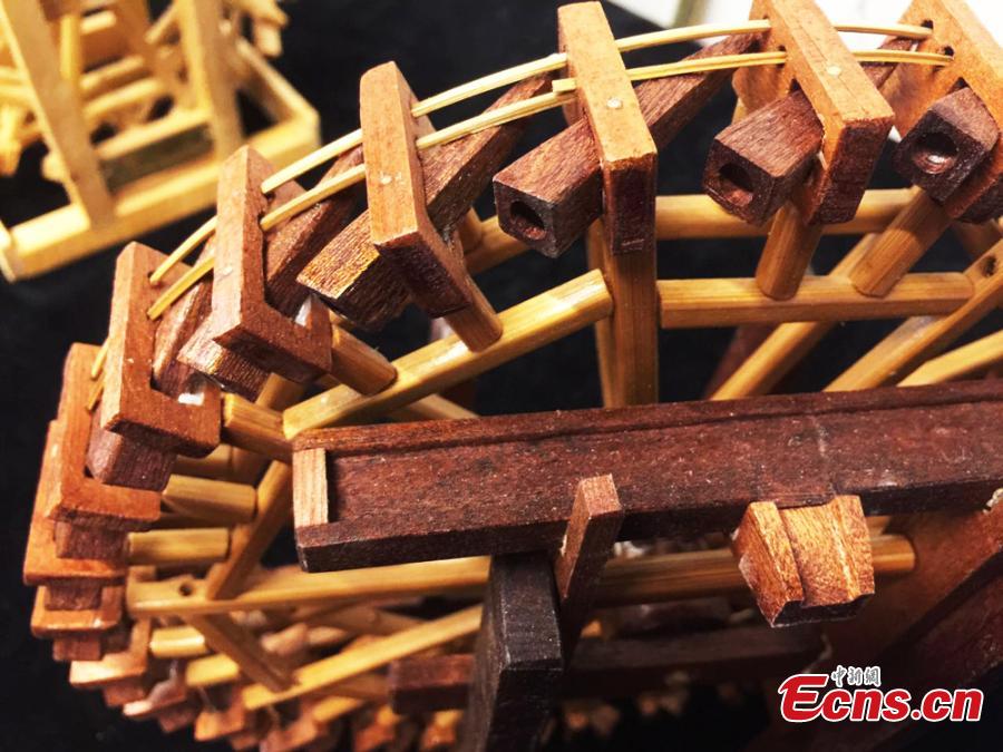 Old man creates miniature waterwheels without nails