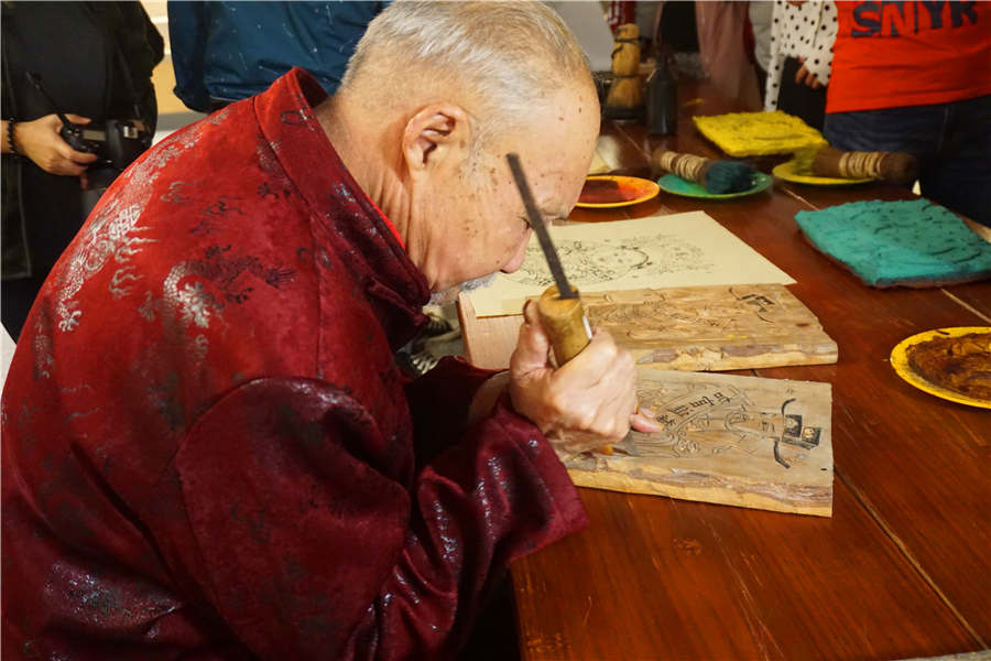 88-year-old wood engraver carves name in history books