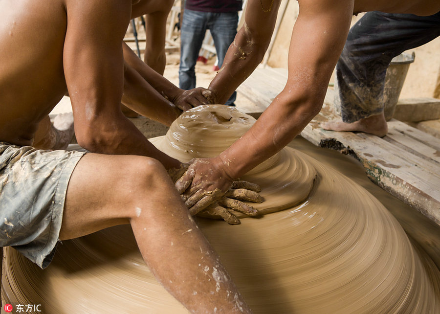 Sweat and clay: Process of making Jingdezhen's porcelain