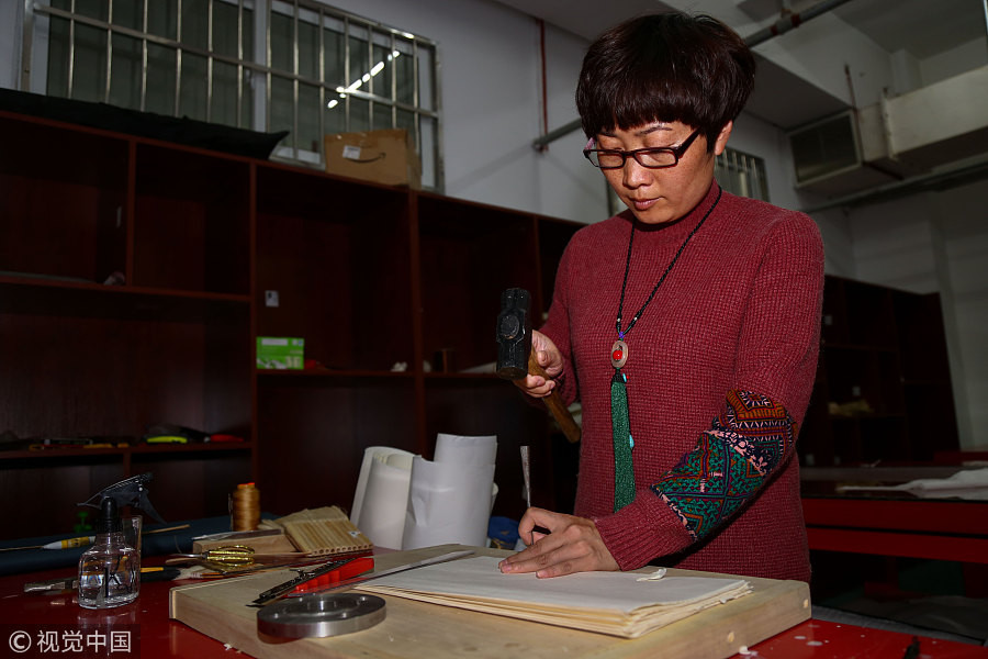 Restorer revives thousands of ancient books