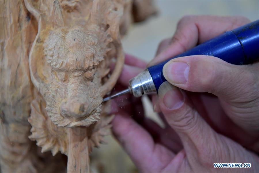 National carving vocational skill contest held in E China's Jiangxi