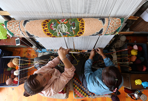 Man helps renew county's interest in Tibetan tapestry