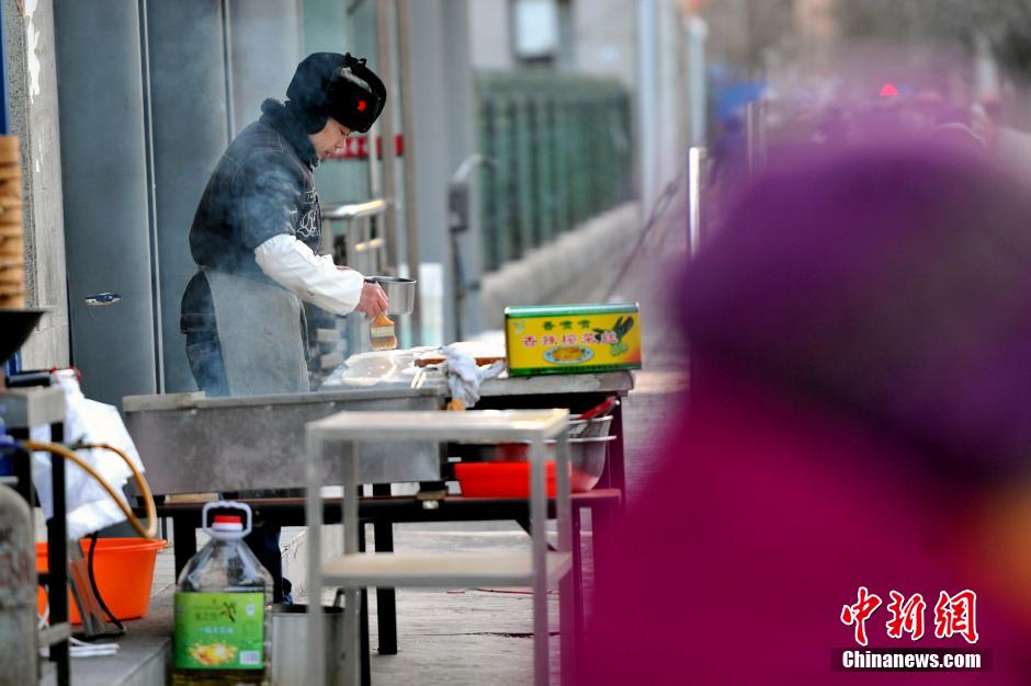 中国多地大风降温 京城迎入冬最冷一天