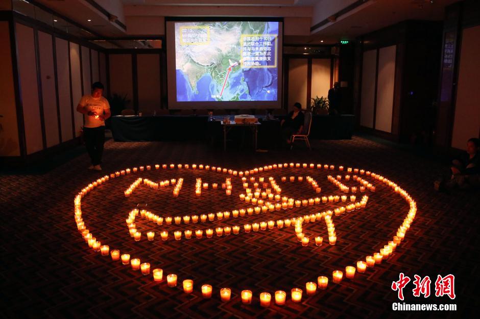 MH370航班失联满月 在京乘客家属举行祈福活动