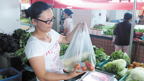 常德80后美女菜贩在长沙卖二维码蔬菜