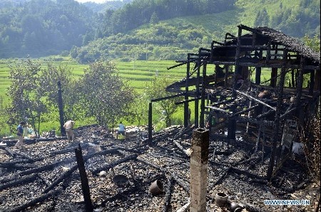 Fire engulfs a village populated by Miao and Dong minority in Hunan, leaves 248 homeless