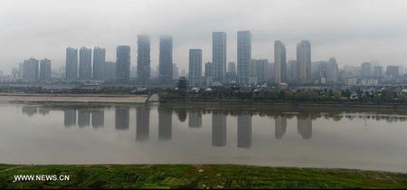 Shower and fog blanket central China's Changsha