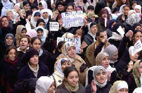 Muslim women march against scarf ban