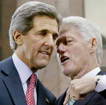 Democratic presidential nominee John Kerry (L) talks to former U.S. President Bill Clinton at a rally in Philadelphia, Pennsylvania October 25, 2004. The rally marked former President Clinton's first campaign appearance for Senator Kerry since Clinton's heart surgery. [Reuters]