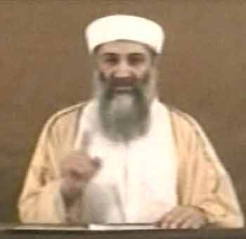 Appearing in a video released from hiding to Al Jazeera TV on October 29, 2004, Al Qaeda leader Osama bin Laden makes a point with his finger during a taped address. [Reuters]