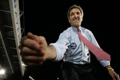 Democratic Presidential candidate Sen. John Kerry, D-Mass., greets the crowd at a rally at the Bayfront Park Amphitheater in Miami, Fla. Friday, Oct. 29, 2004. [AP]
