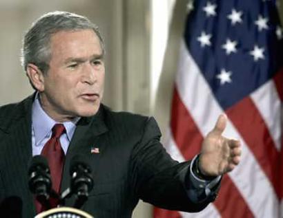 US President George W. Bush speaks at a news with British Prime Minister Tony Blair(not pictured) at the White House in Washington, November 12, 2004. Bush vowed on Friday to use the next four years to help establish a Palestinian state, and he and Blair said they would help craft a post-Arafat strategy for making it happen. [Reuters]
