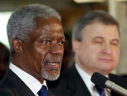 U.N. Secretary General Kofi Annan addresses as Russia's ambassador to U.N. Andrey Denisov (R) announced his country's ratification of the Kyoto Climate treaty during the Security Council meeting in Nairobi, November 18, 2004. Russia formally ratified the Kyoto Protocol on global warming, clearing the way for the international environment accord to come into force early next year. [Reuters]
