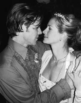 Actress Julia Roberts and her cameraman boyfriend Daniel Moder kiss during their wedding ceremony in this Thursday, July 4, 2002 file photo, at her 40-acre estate outside Taos, N.M. Roberts gave birth to twins Hazel Patricia Moder and Phinnaeus Walter Moder on Sunday morning at a Southern California hospital, publicist Marcy Engelman said Sunday.