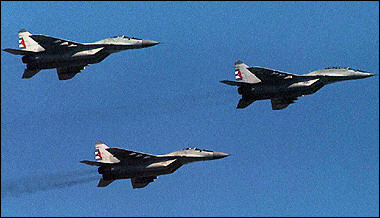 Soviet-made MIG-29 fighters fly over Havana during a military parade. Cuba's armed forces are gearing up for their biggest military exercises in almost 20 years, with hundreds of thousands of troops and millions of civilians expected to take part, officials said. [AFP/file]