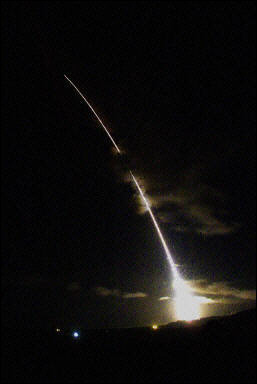 A missile emerges from behind a hill and streaks into the atmosphere during a test launch 03 December, 2001 at Vandenberg Air Force Base in California, the US. The US Missile Defence Agency said that a planned missile test over the Pacific Ocean had failed as the interceptor missile did not take off and was automatically shut down. [AFP/file]