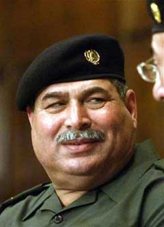Former Iraqi Defense Minister Sultan Hashim Ahmad, seen in this March 23, 2003 file photo. Saddam Hussein's defense minister, who surrendered to American forces last year, will appear along with another notorious general, known as Chemical Ali, when investigative trials open next week, an official said Friday Dec. 17, 2004. [AP]
