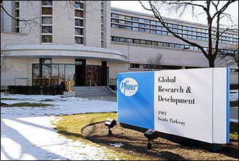 Pfizer Global Research and Development signage is seen outside an entrance to its facility January 22, 2004 in Skokie, Illinois. Three US doctors have called for physicians worldwide to stop prescribing the pain-killing drug Bextra which is made by Pfizer, whose Celebrex drug was the subject of a separate warning.(AFP