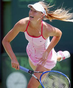 Maria Sharapova, 
 of 
 Russia, follows through on her serve to Venus Williams at the Nasdaq 100 Open in Key Biscayne, Fla., Thursday, March 31, 2005. [AP]