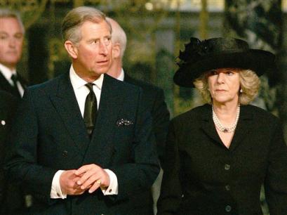 Britain's Prince Charles and Camilla Parker Bowles attend a service in memory of Pope John Paul II at London's Westminster Cathedral Monday April 4, 2005. Prince Charles has postponed his marriage to Camilla Parker Bowles from Friday to Saturday so that he can attend the funeral of Pope John Paul in Rome. [AP]