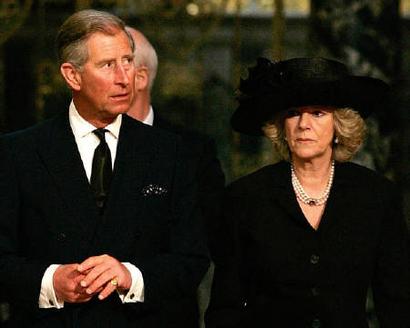 Britain's Prince Charles (L) and Camilla Parker-Bowles attend a service in memory of Pope John Paul II at London's Westminster Cathedral April 4, 2005. REUTERS/Kieran Doherty 