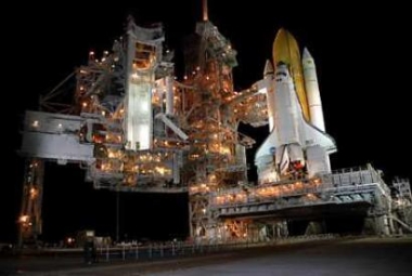 NASA plans to delay the launch of space shuttle Discovery -- the first shuttle set to fly since the 2003 Columbia accident -- from May until July, an official familiar with NASA's timetable said on April 28, 2005. The official, speaking on condition of anonymity, said the decision was made by NASA's new administrator, Michael Griffin, and would be formally announced on Friday. Discovery is seen on the launch pad at KSC on April 13. (NASA/Reuters