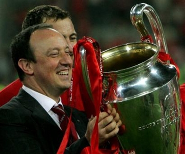 Liverpool's coach Rafael Benitez, holds the trophy after Liverpool's victory in the UEFA Champions League Final between AC Milan and Liverpool at the Ataturk Olympic Stadium in Istanbul, Turkey,Wednesday May 25, 2005. Liverpool won the match 3-2 on penalties.(AP