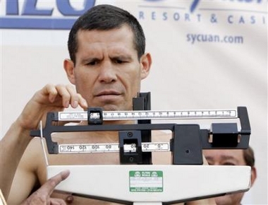 Julio Cesar Chavez, of Mexico, is weighed at Staples Center Friday, May 27, 2005. Chavez and Ivan Robinson meet in a 10-round welterweight bout on the Top Rank 'Adios' card at Staples on Saturday. (AP