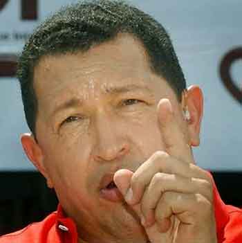 Venezuelan President Hugo Chavez gestures during his broadcast 'Alo Presidente' in Monagas state, 500km (300 miles) from Caracas, June 12, 2005. President Chavez blamed U.S. President George W. Bush on Sunday for Bolivia's crisis and said Bush's 'poisoned medicine' of free-market democracy was being rejected by Latin America. REUTERS