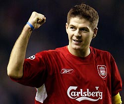 Liverpool's captain Steven Gerrard is shown celebrating beating Olympiakos Piraeus in a Champions League Group A soccer match at Anfield in Liverpool in this December 8, 2004 file photo. [Reuters]