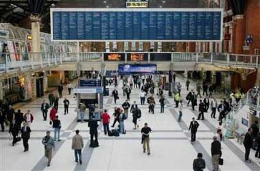 Commuters arrive at London's Liverpool Street subway station Friday, July 8, 2005. Police have confirmed that at least 37 people died in Thursday's terror attacks on the capital, and said there were 700 others injured. (AP 