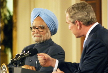 Indian Prime Minister Manmohan Singh (left) listens as US President George W. Bush (R) speaks at a joint press conference in the East Room of the White House in Washington D.C. on Monday(AFP