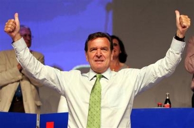 German Chancellor Gerhard Schroeder thumbs up during a party meeting of the Social Democratic Party of German federal state Rhineland-Palatinate in Mainz, central Germany, Saturday, July 16, 2005. (AP