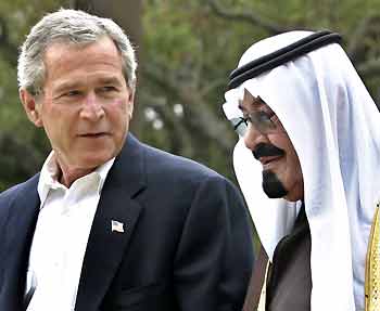 U.S. President George W. Bush walks with Saudi Arabia's Crown Prince Abdullah (R) on his ranch in Crawford, Texas in this April 25, 2005 file photo.