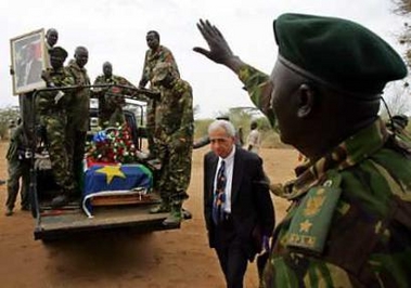 Soldiers carry the coffin of former rebel leader John Garang in New Site villege in Southern Sudan August 4, 2005.
