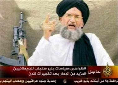 This image made from an undated video broadcast Thursday, Aug. 4, 2005 on pan-Arab satellite channel Al-Jazeera, shows al-Qaida's Ayman al-Zawahri speaking Kalashnikov rifle propped up behind him at an undisclosed location.