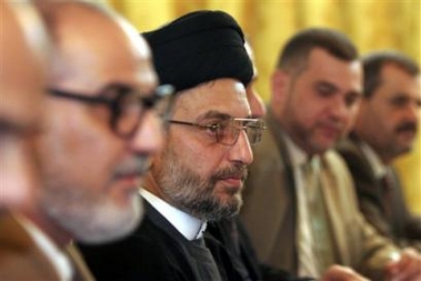 Iraq's Abdul-Aziz al-Hakim, centre, leader of the Supreme Council for the Islamic Revolution, sits with Shiite and Kurdish leaders during a meeting at his home, Thursday, Aug. 11, 2005 in Baghdad, Iraq. The meeting was part of ongoing talks aimed at resolving disagreements in the drafting of Iraq's new constitution before its Monday, Aug. 15 deadline.